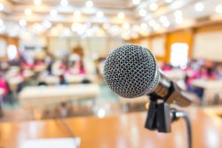 Black microphone in conference room