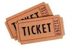Two old movie tickets isolated on a white background.