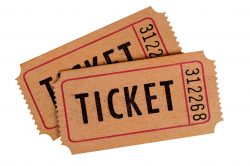 Two old movie tickets isolated on a white background.